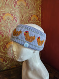 Earwarmer with chicken design. Fully lined