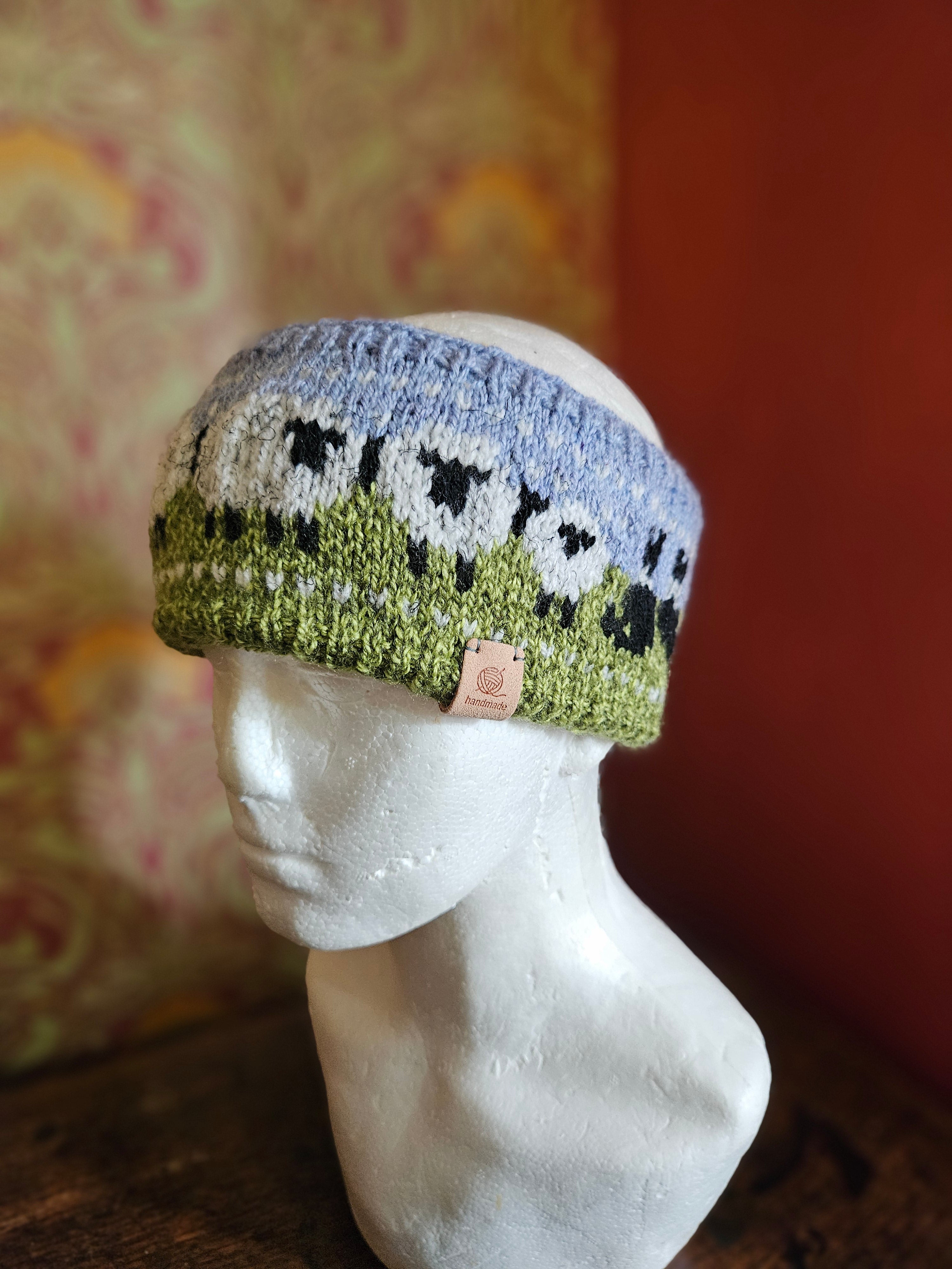 Sheep and collie design earwarmer. Fully lined