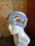 Earwarmer with red collies. Fully lined