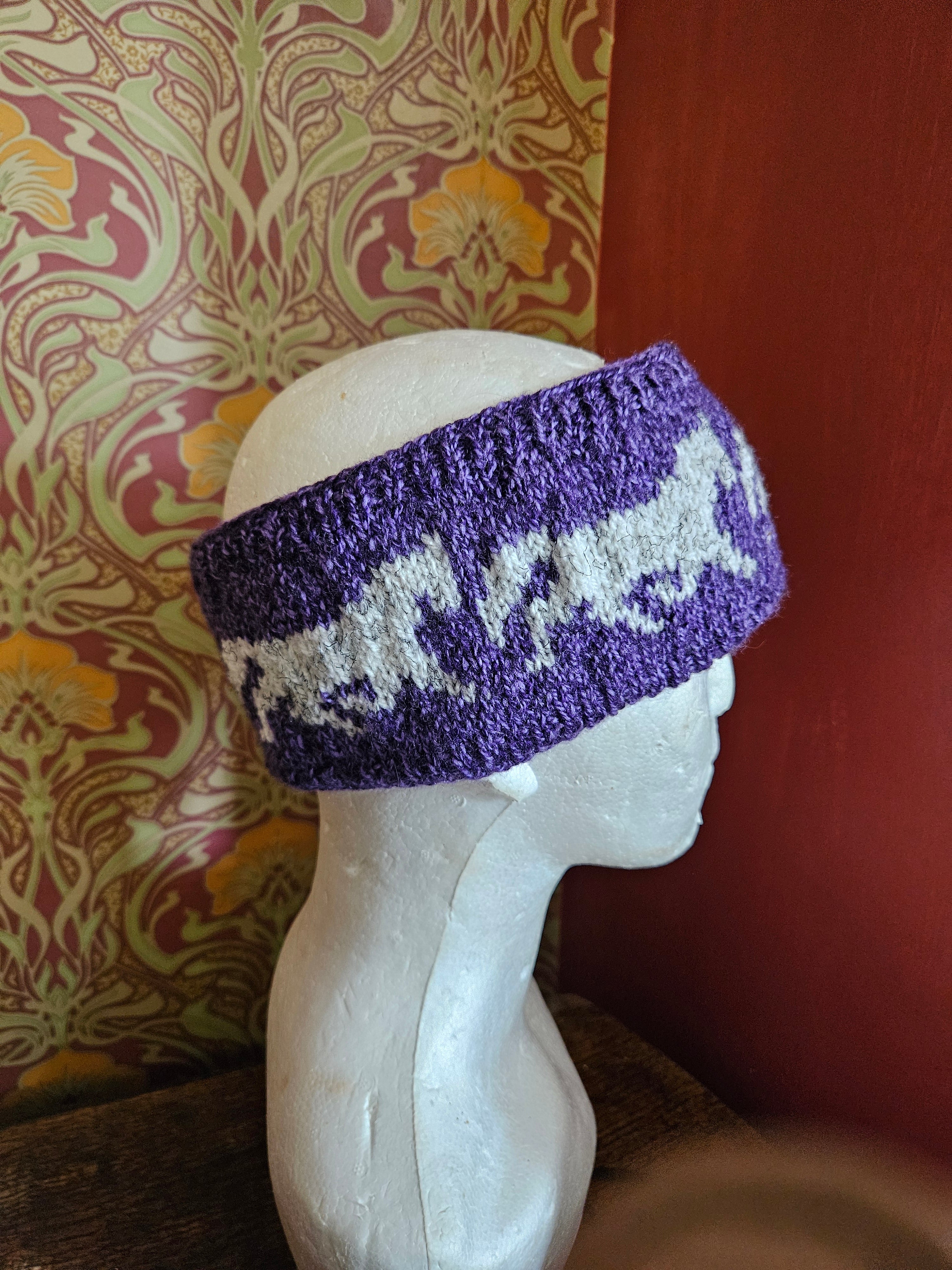 Earwarmer with horse design. Fully lined