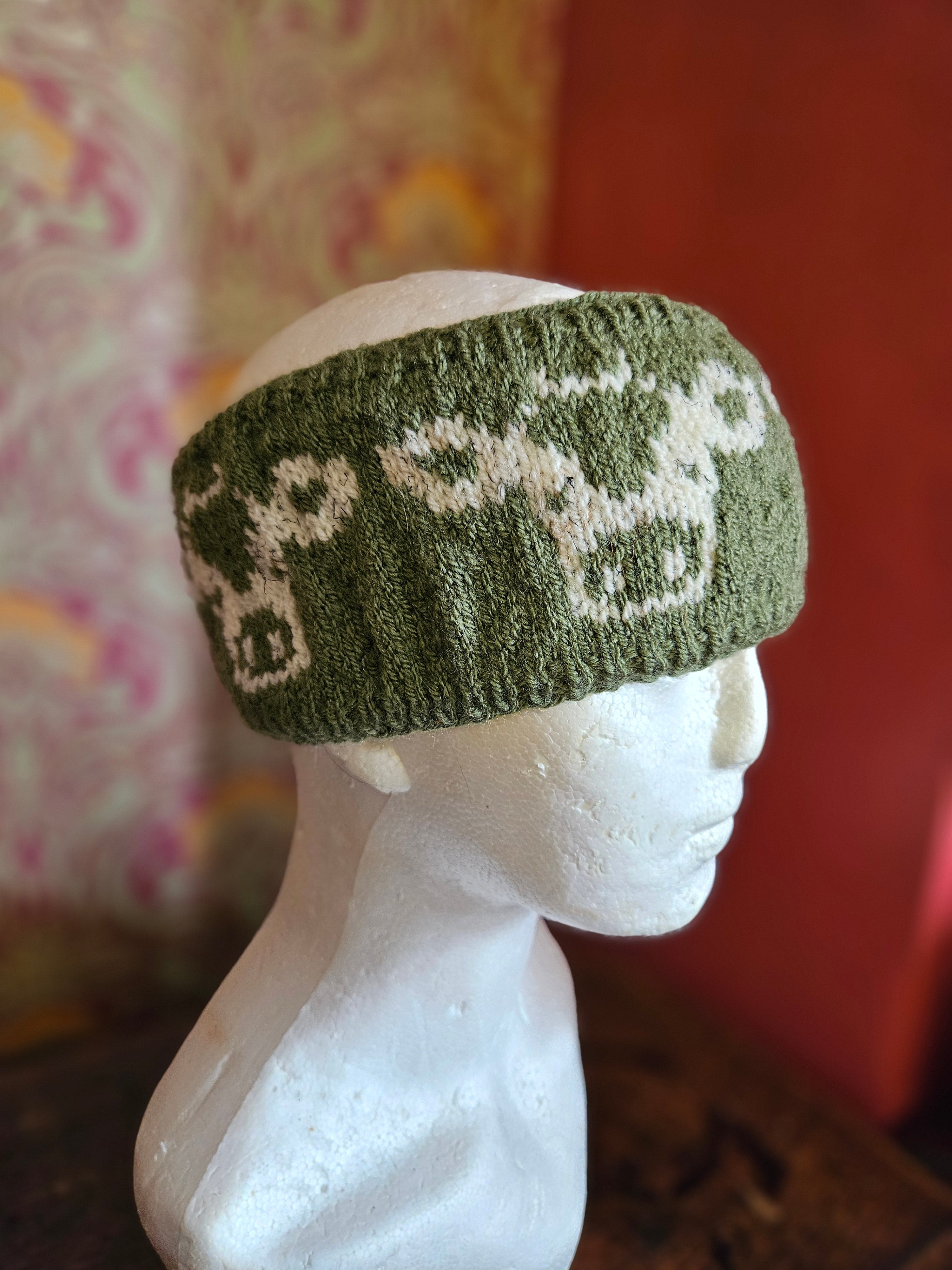 Earwarmer with cow design in olive green