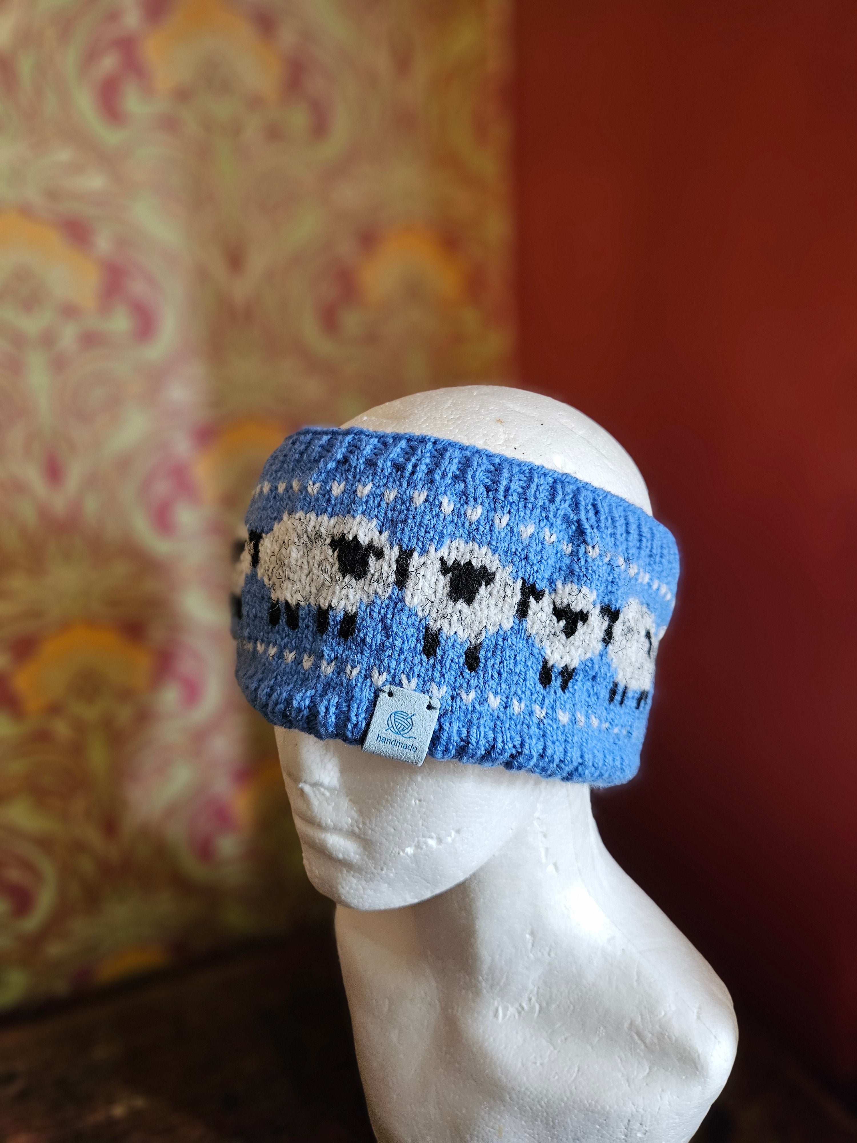Earwarmer with sheep design in blue