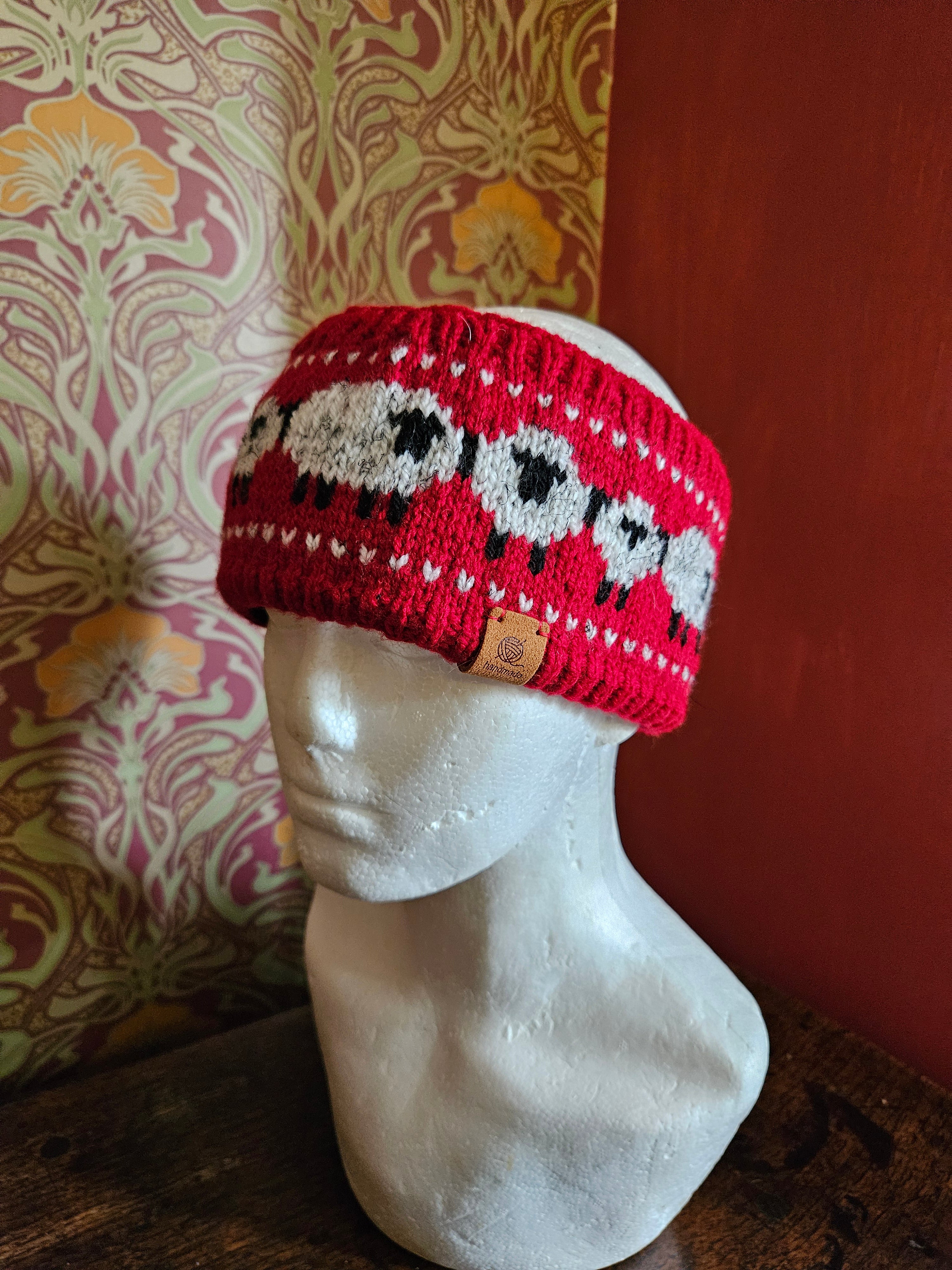 Earwarmer with sheep design.  Fully lined