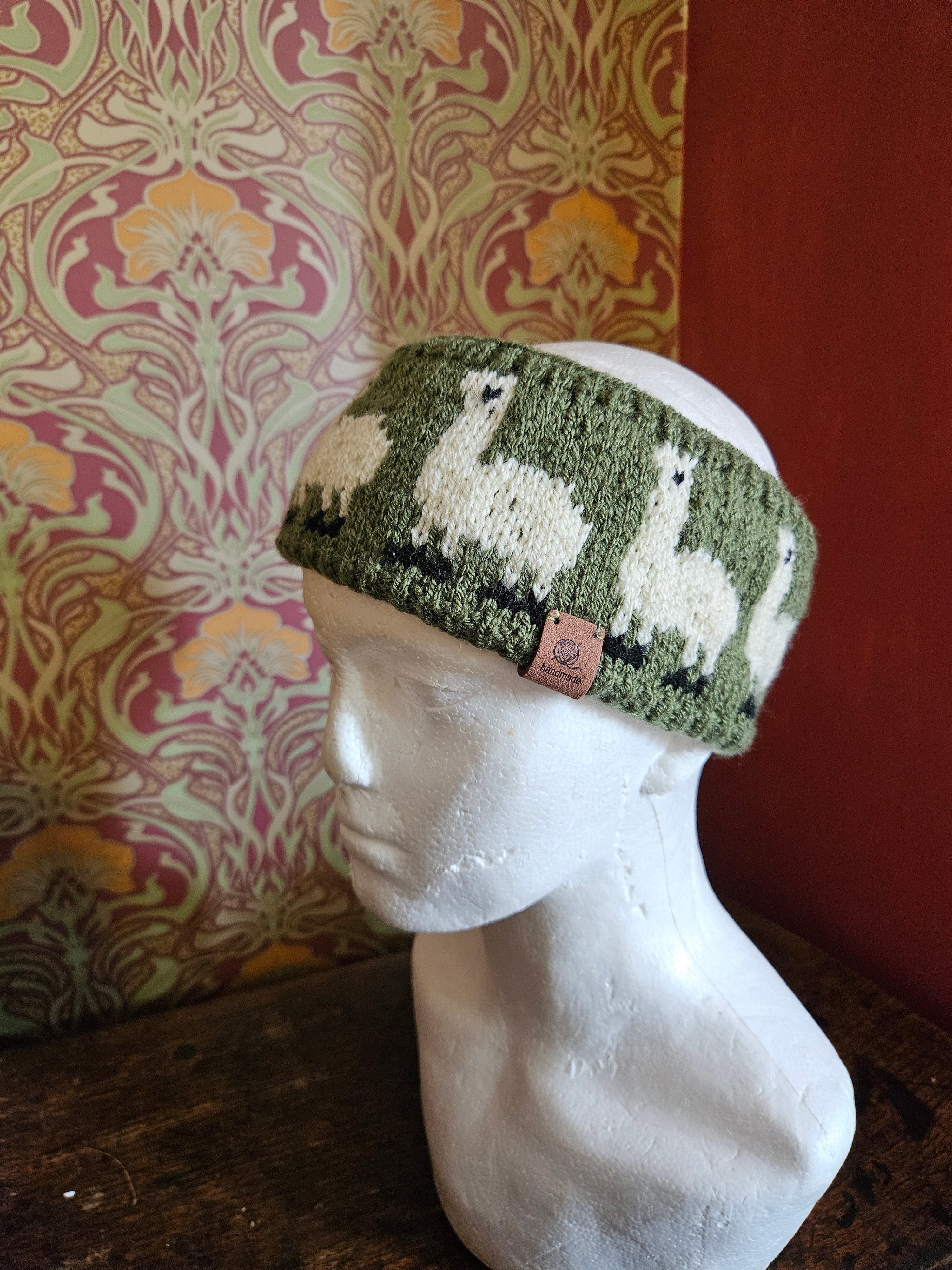 Earwarmer with Alpaca design. Fully lined