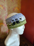 Sheep and collie design earwarmer. Fully lined