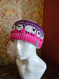 Earwarmer with sheep design. Fully lined