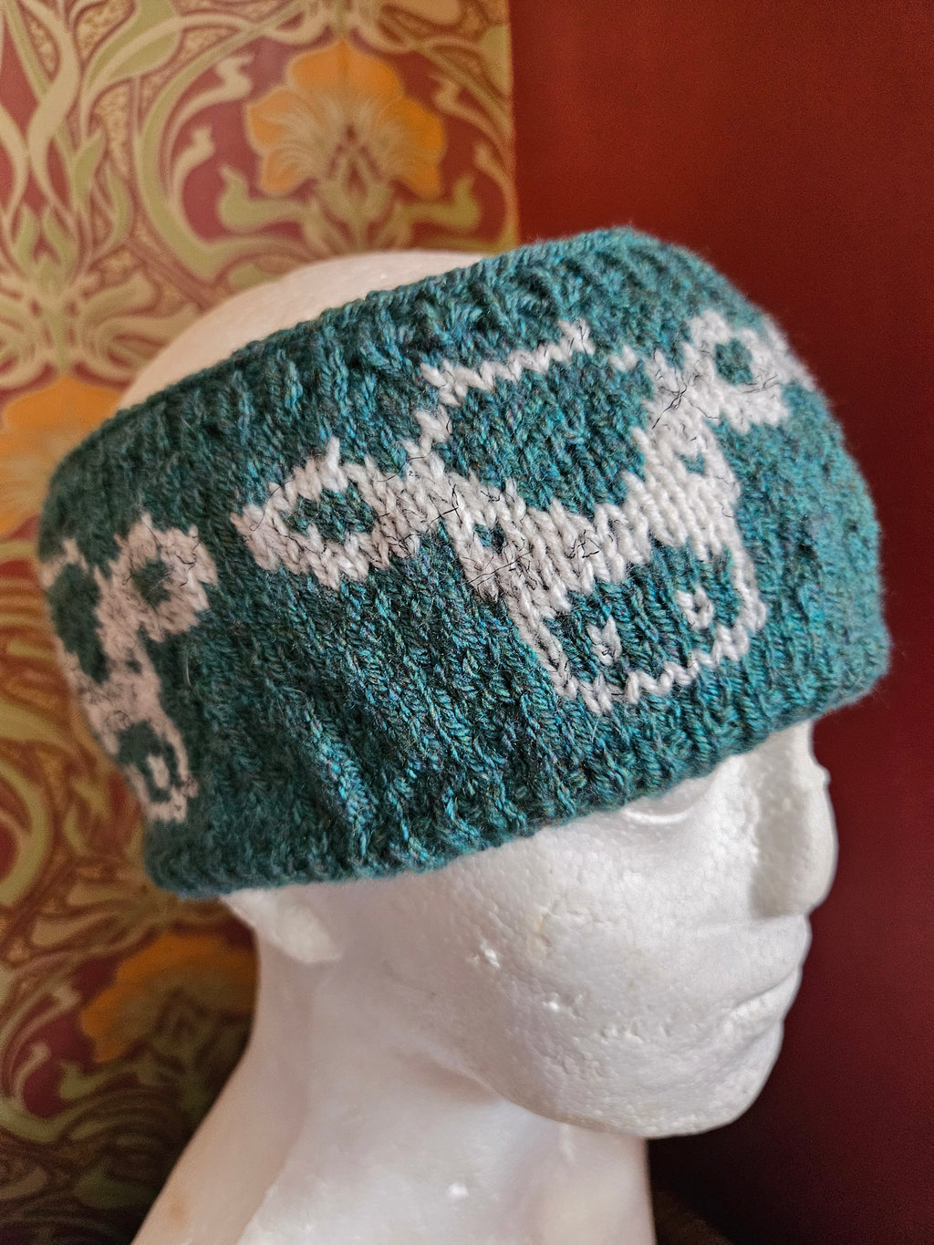 Earwarmer with cow design. Fully lined