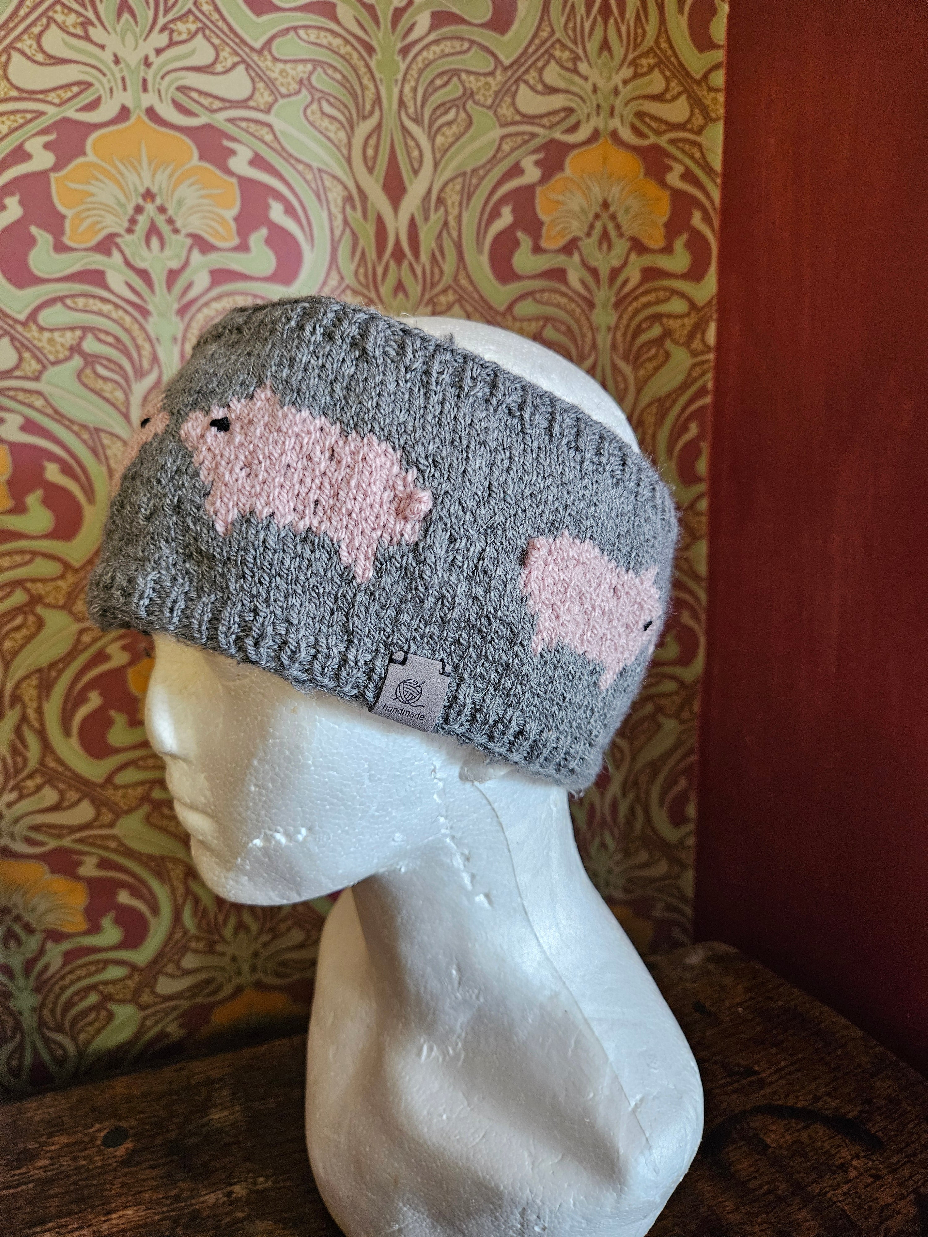 Earwarmer with pig design. Fully lined