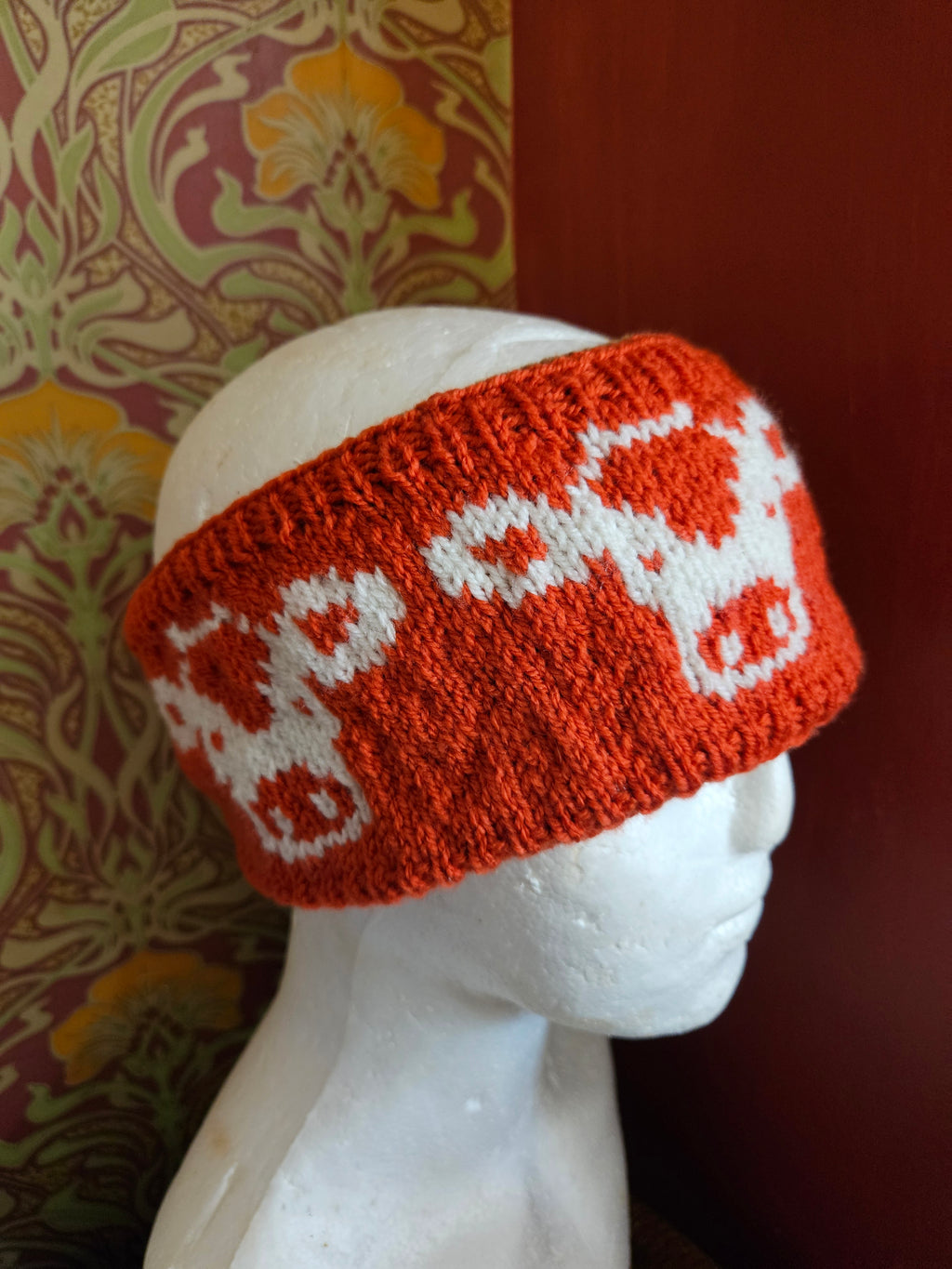 Earwarmer with cow design. Fully lined