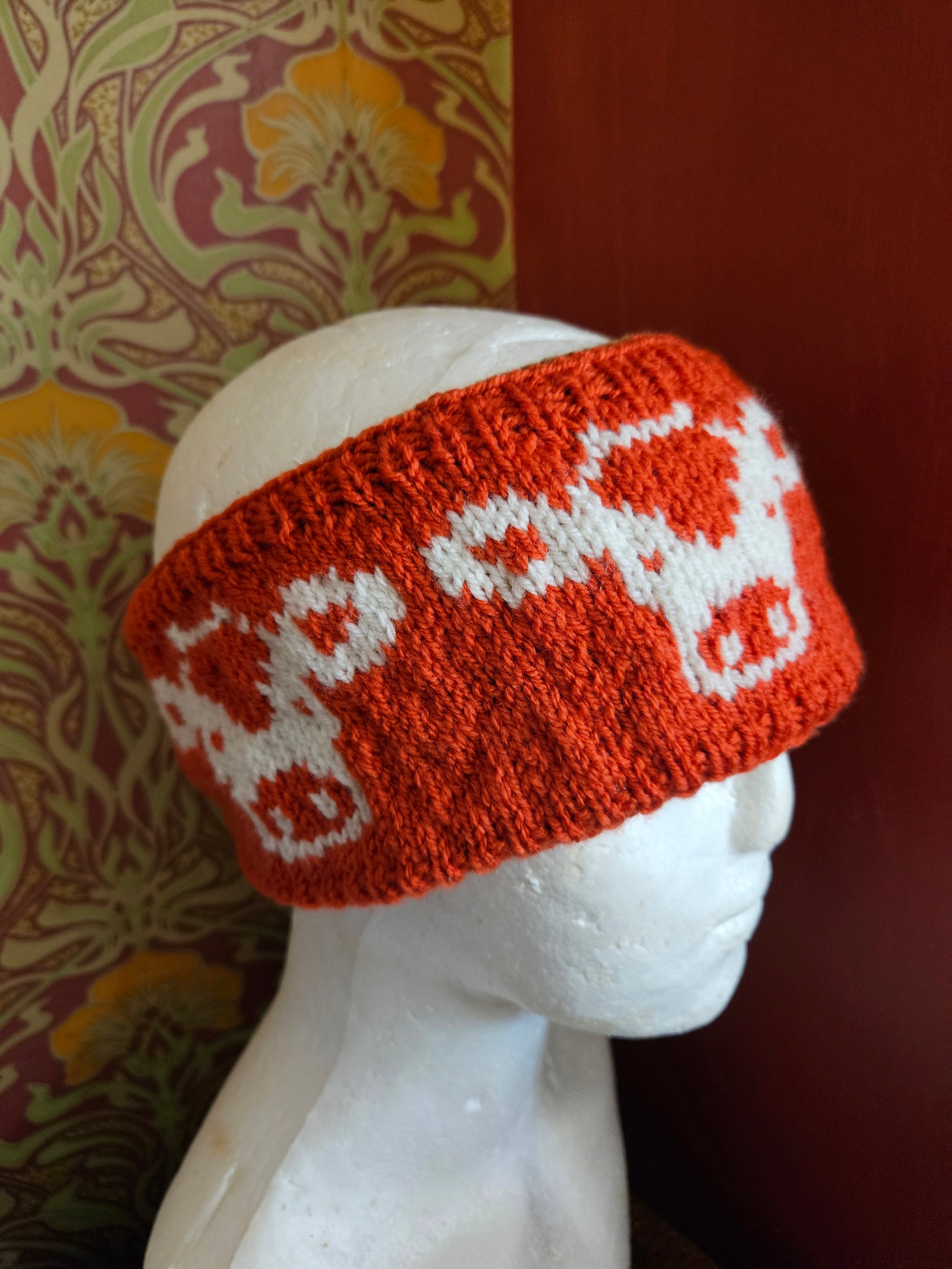 Earwarmer with cow design. Fully lined