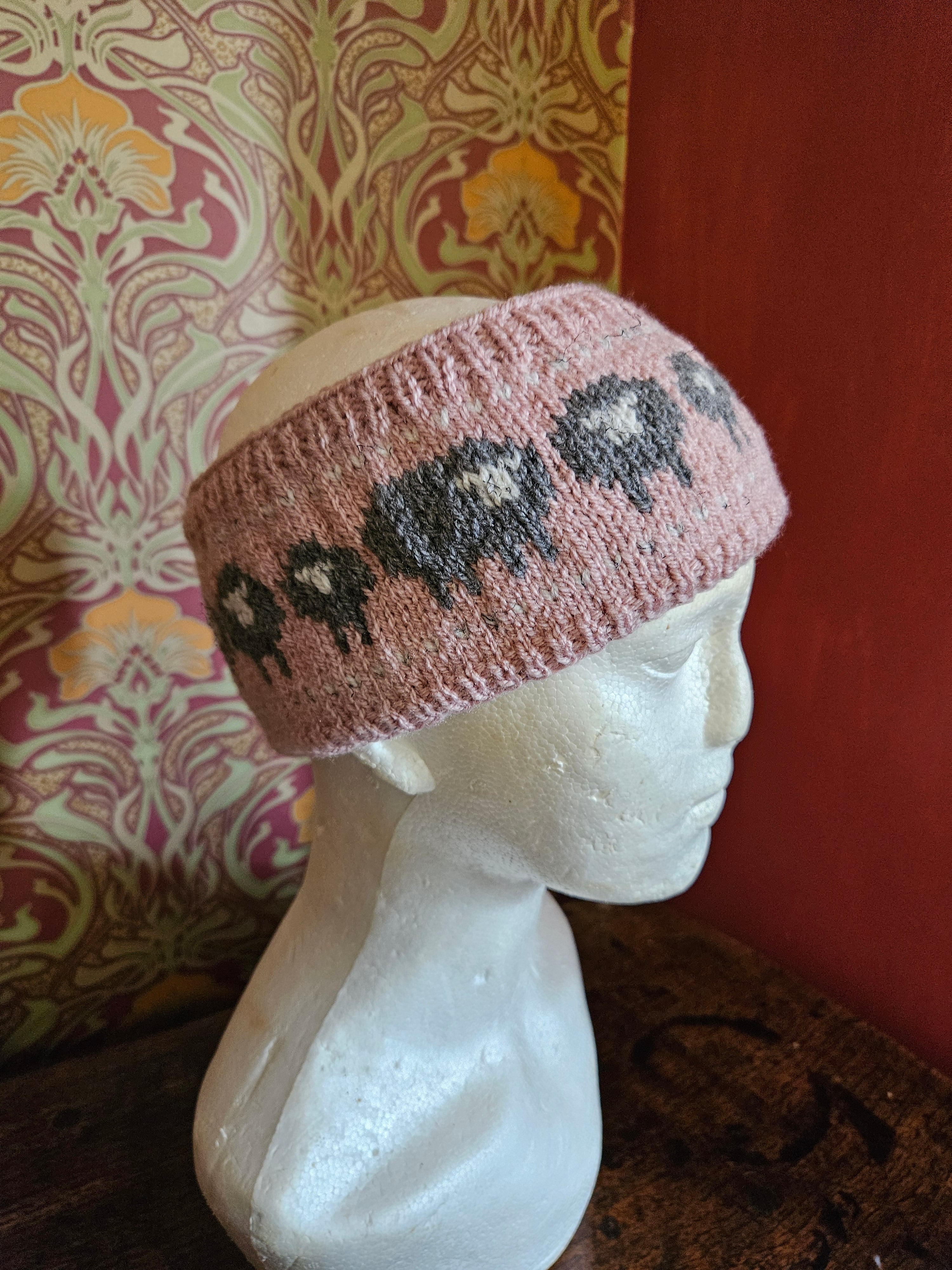 Earwarmer with sheep design. Fully lined