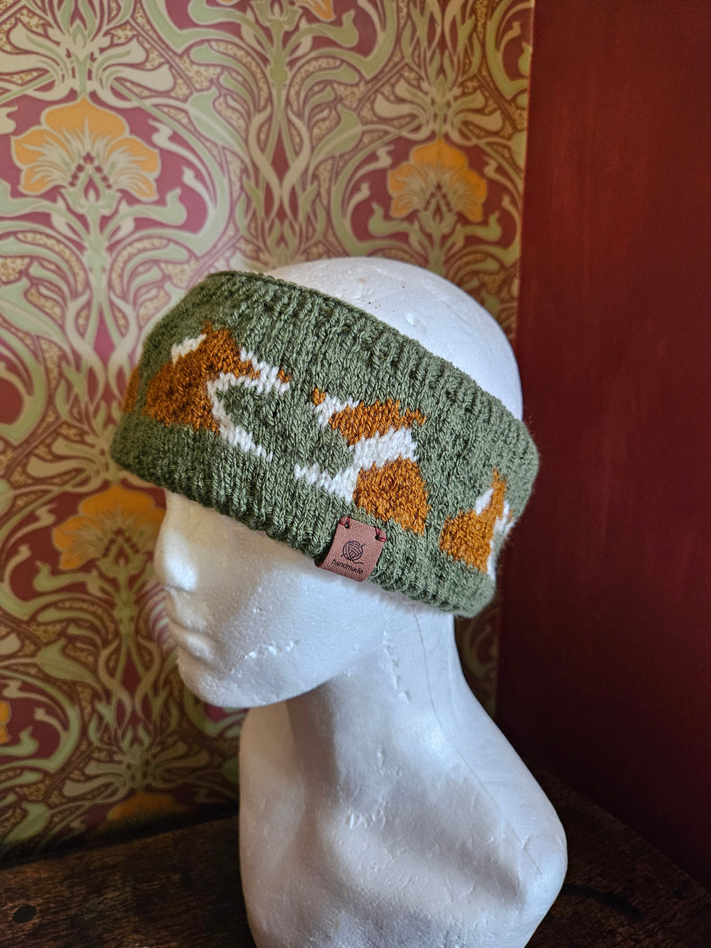 Earwarmer with red collies. Fully lined
