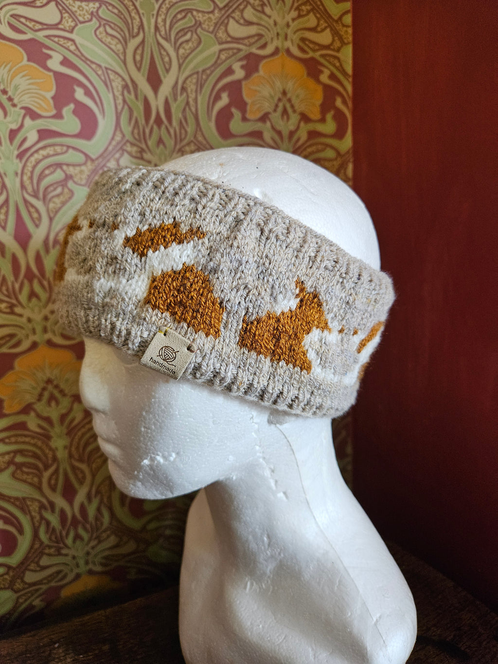 Earwarmer with red collies. Fully lined