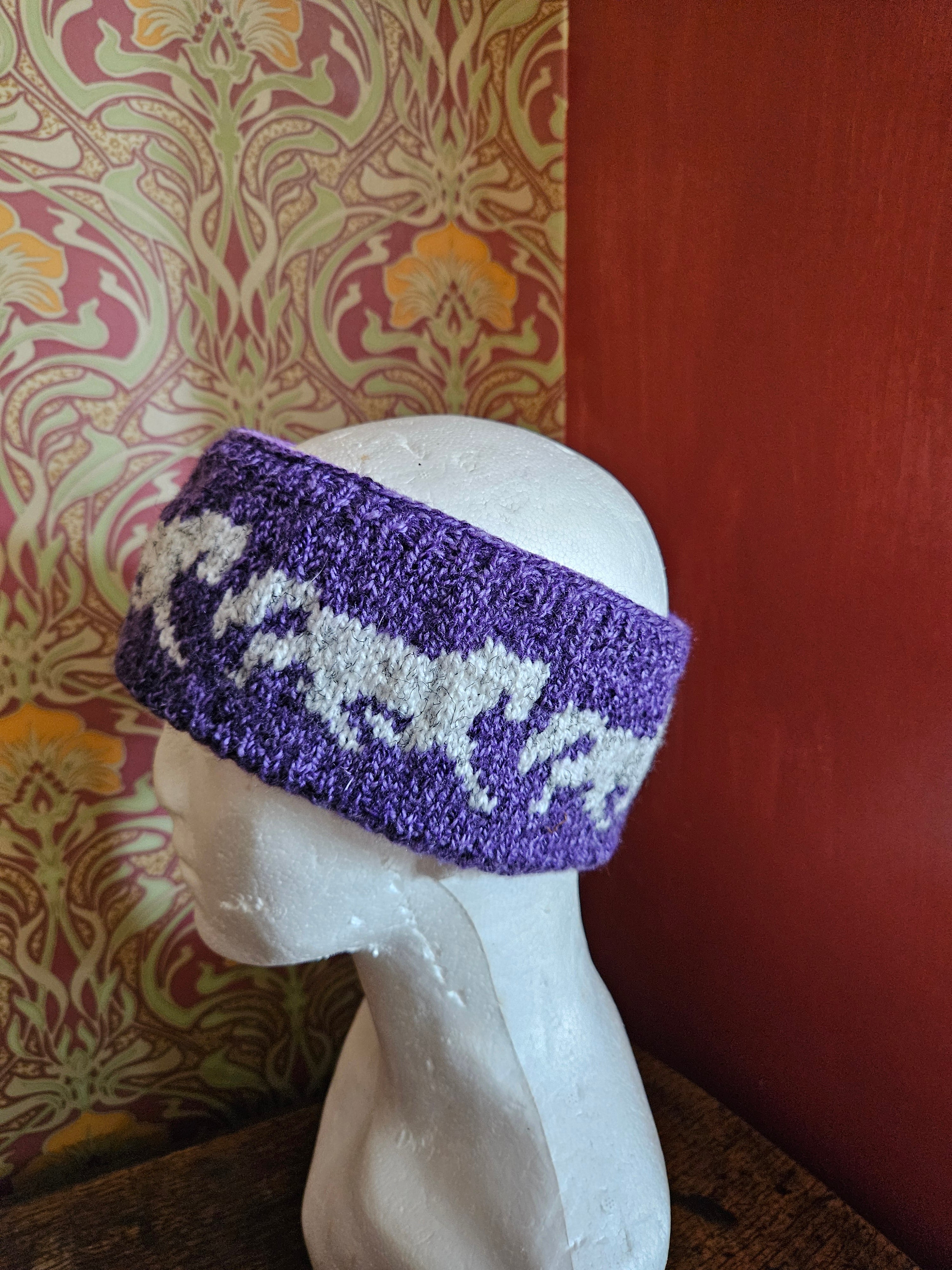 Earwarmer with horse design. Fully lined