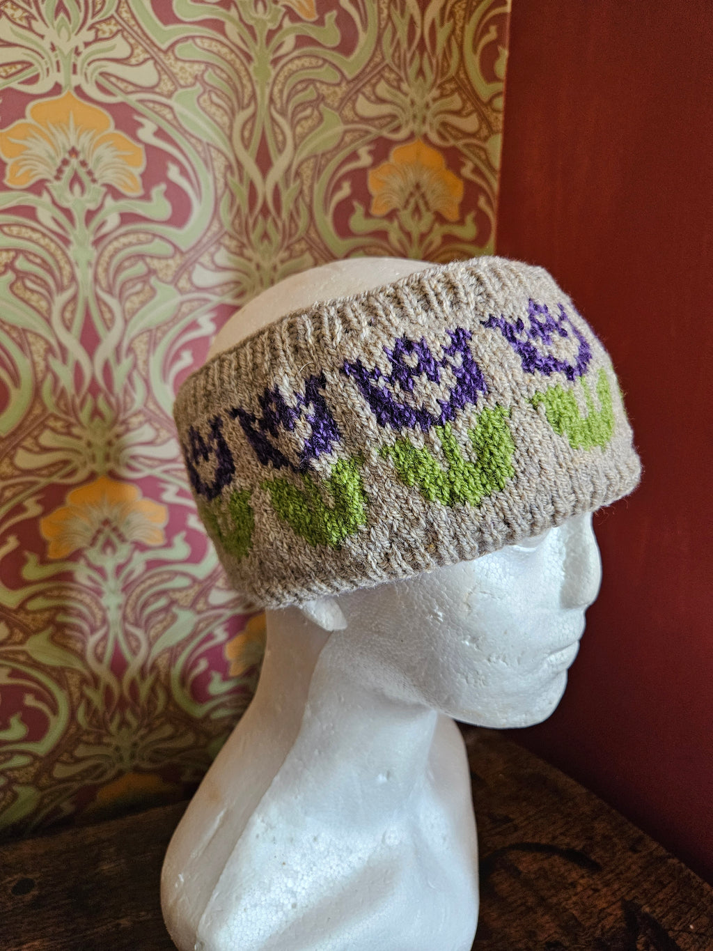 Earwarmer with floral design. Fully lined