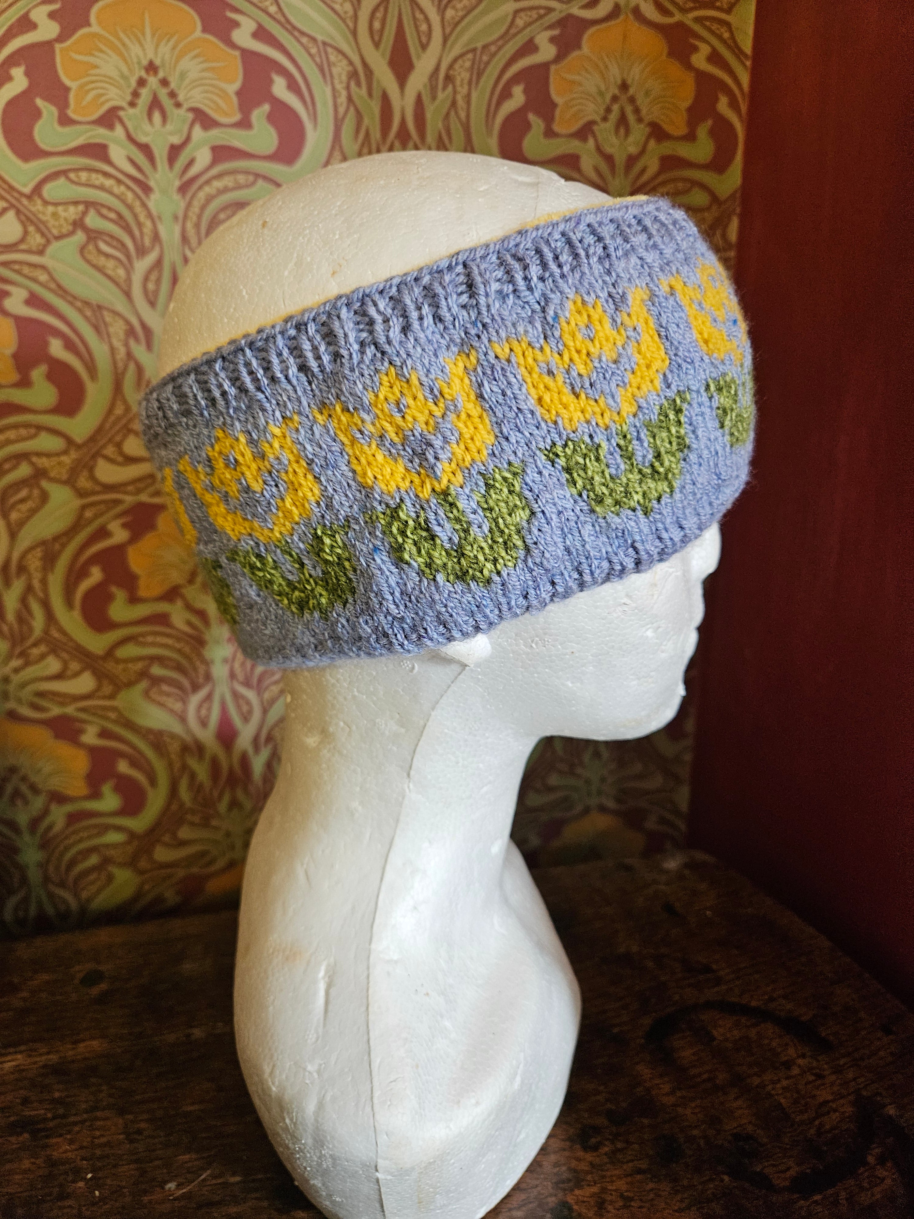 Earwarmer with floral design. Fully lined
