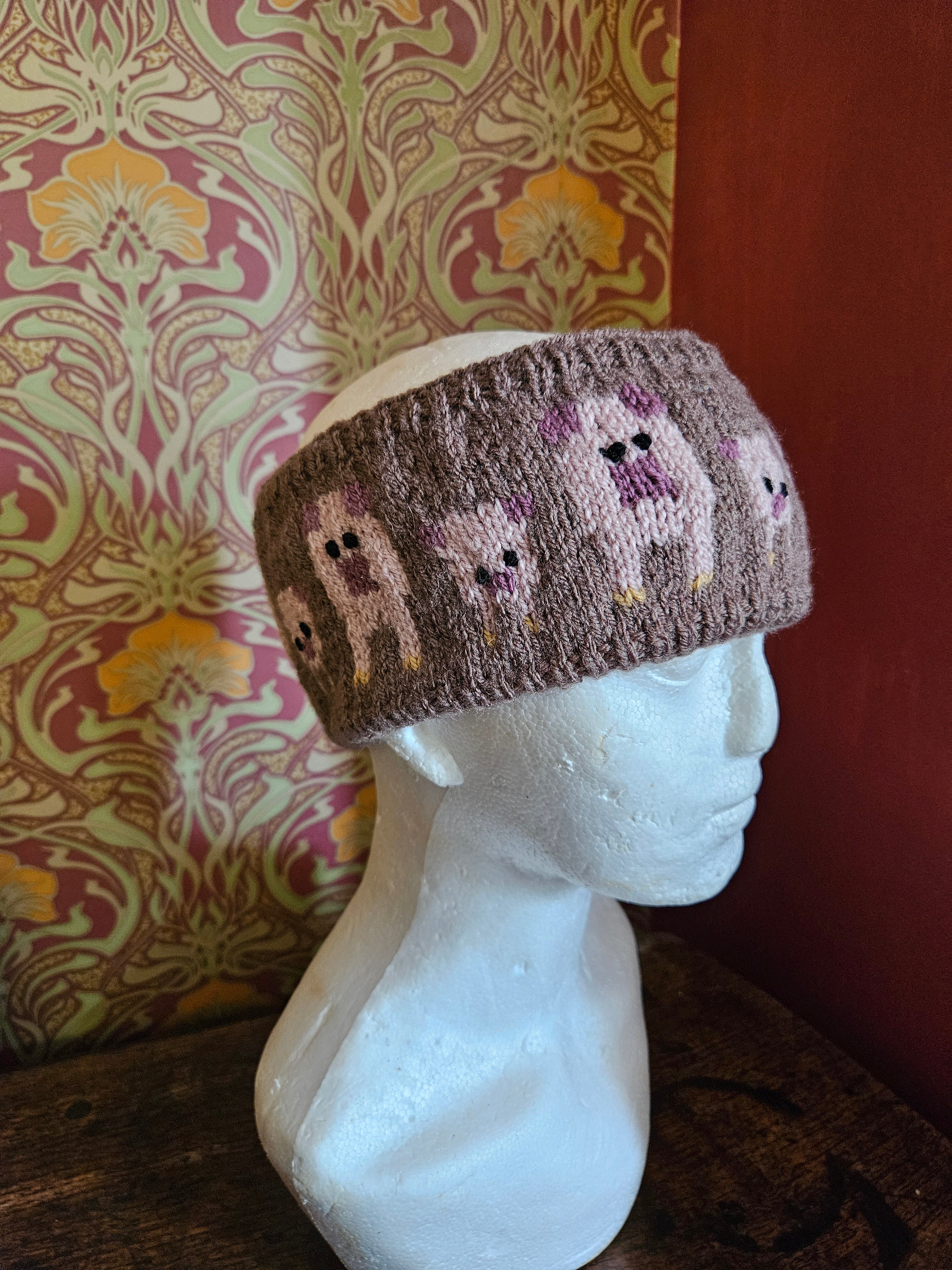 Earwarmer with pig design. Fully lined