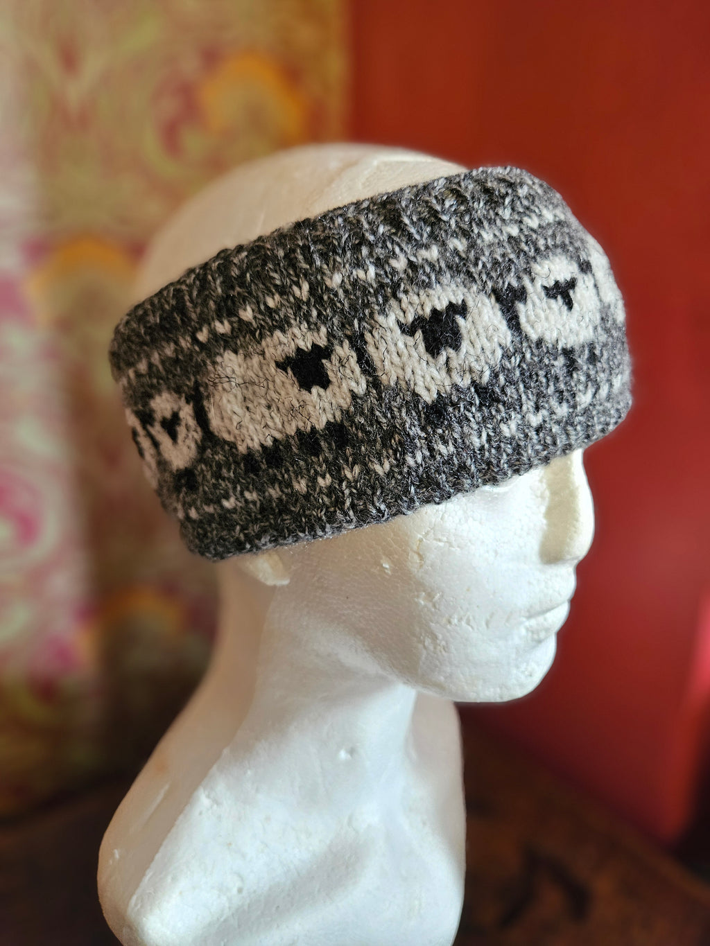 Earwarmer with sheep design. Fully lined