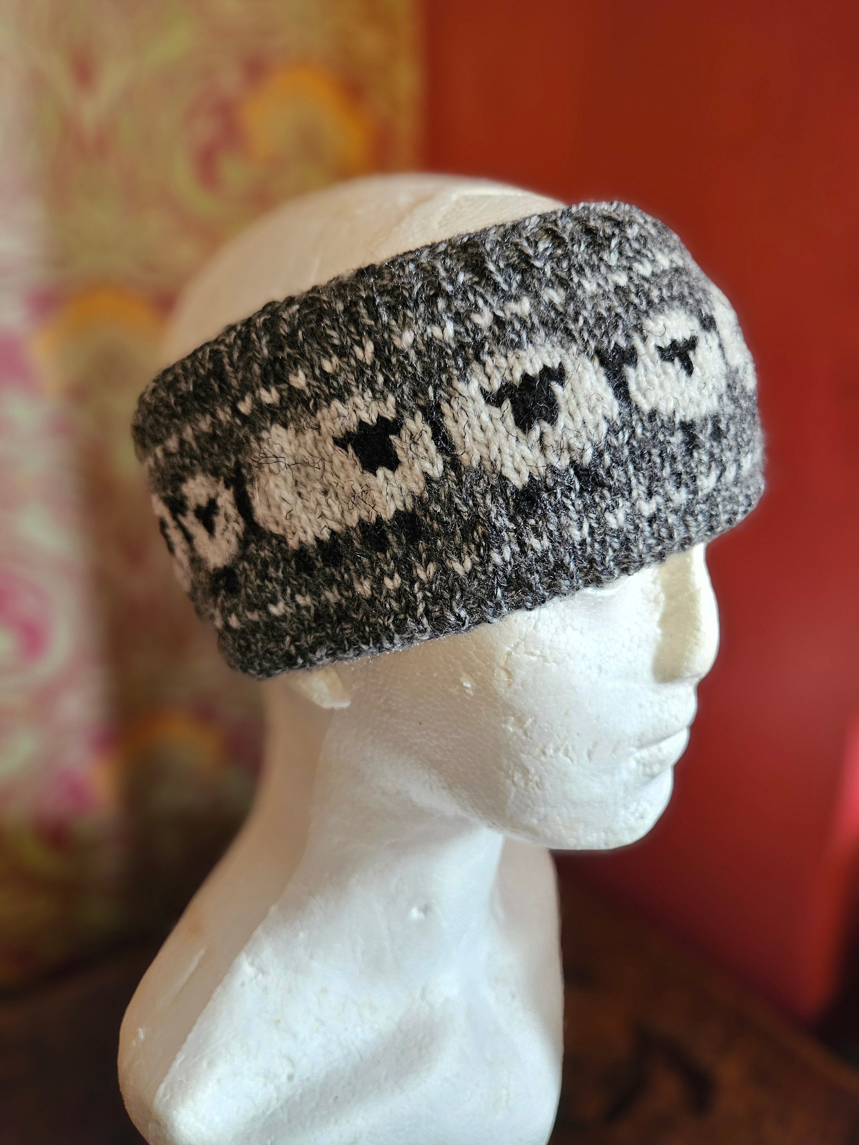 Earwarmer with sheep design. Fully lined