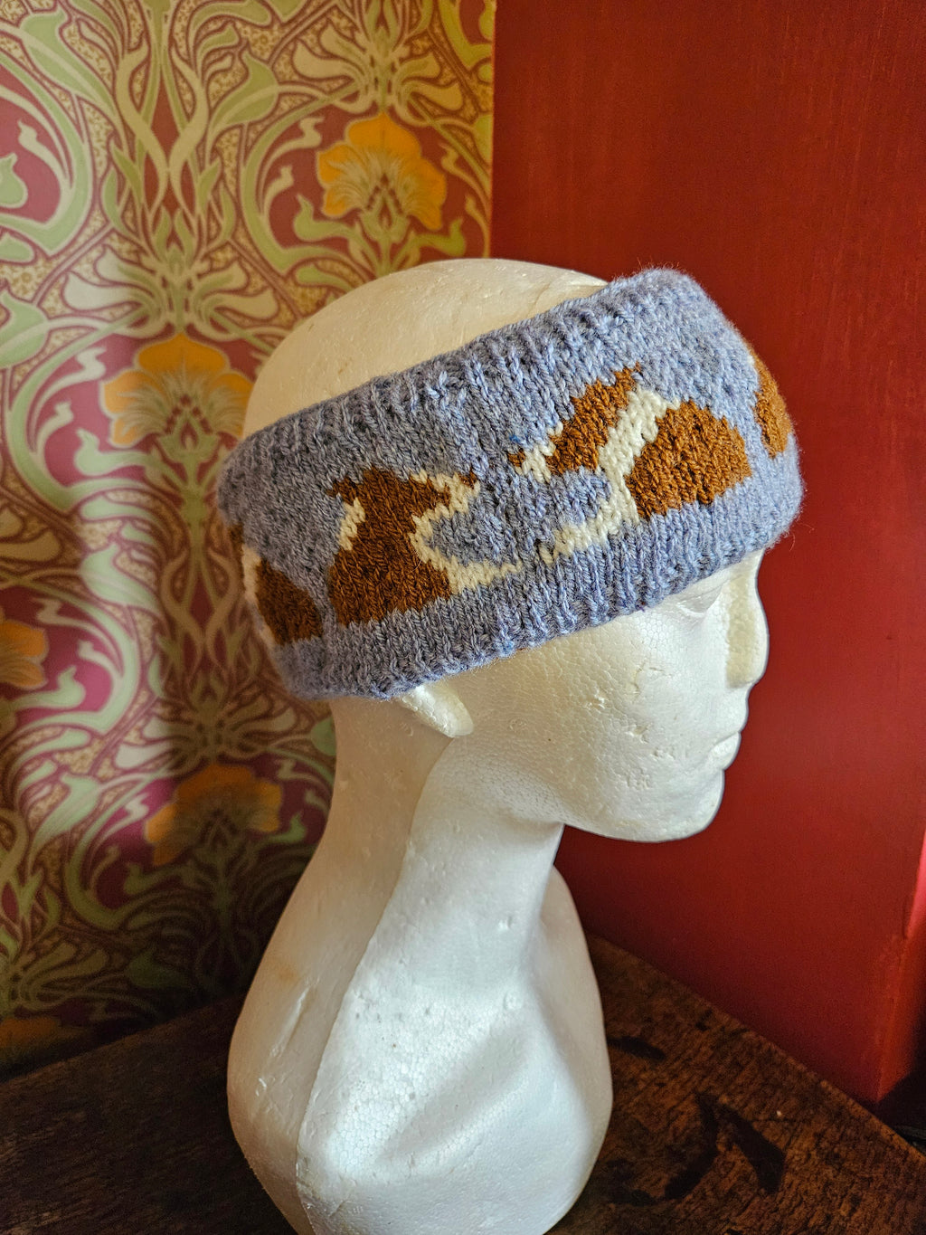 Earwarmer with red collies. Fully lined