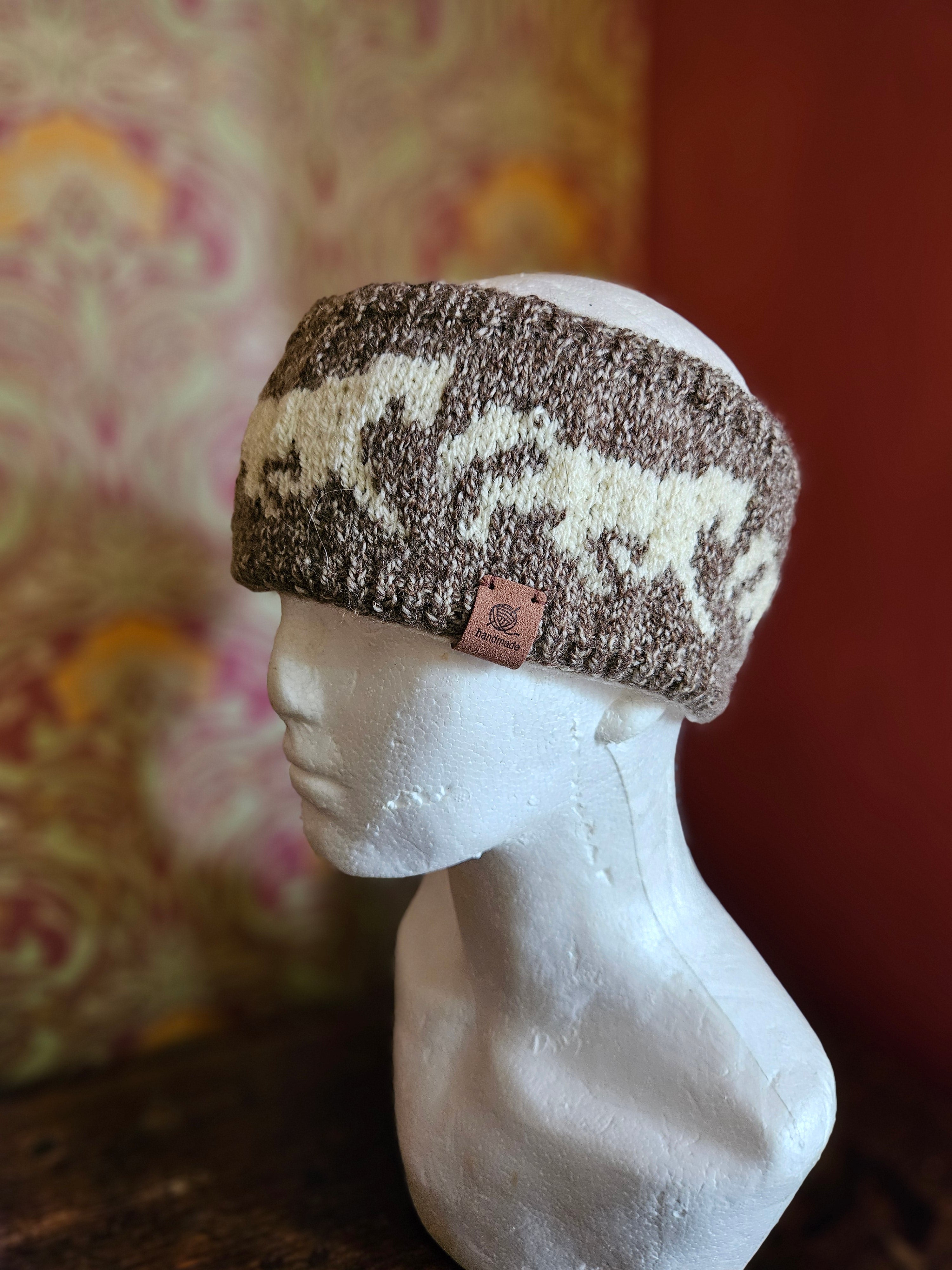 Earwarmer with horse design in soft mid brown