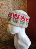 Earwarmer with floral design. Fully lined