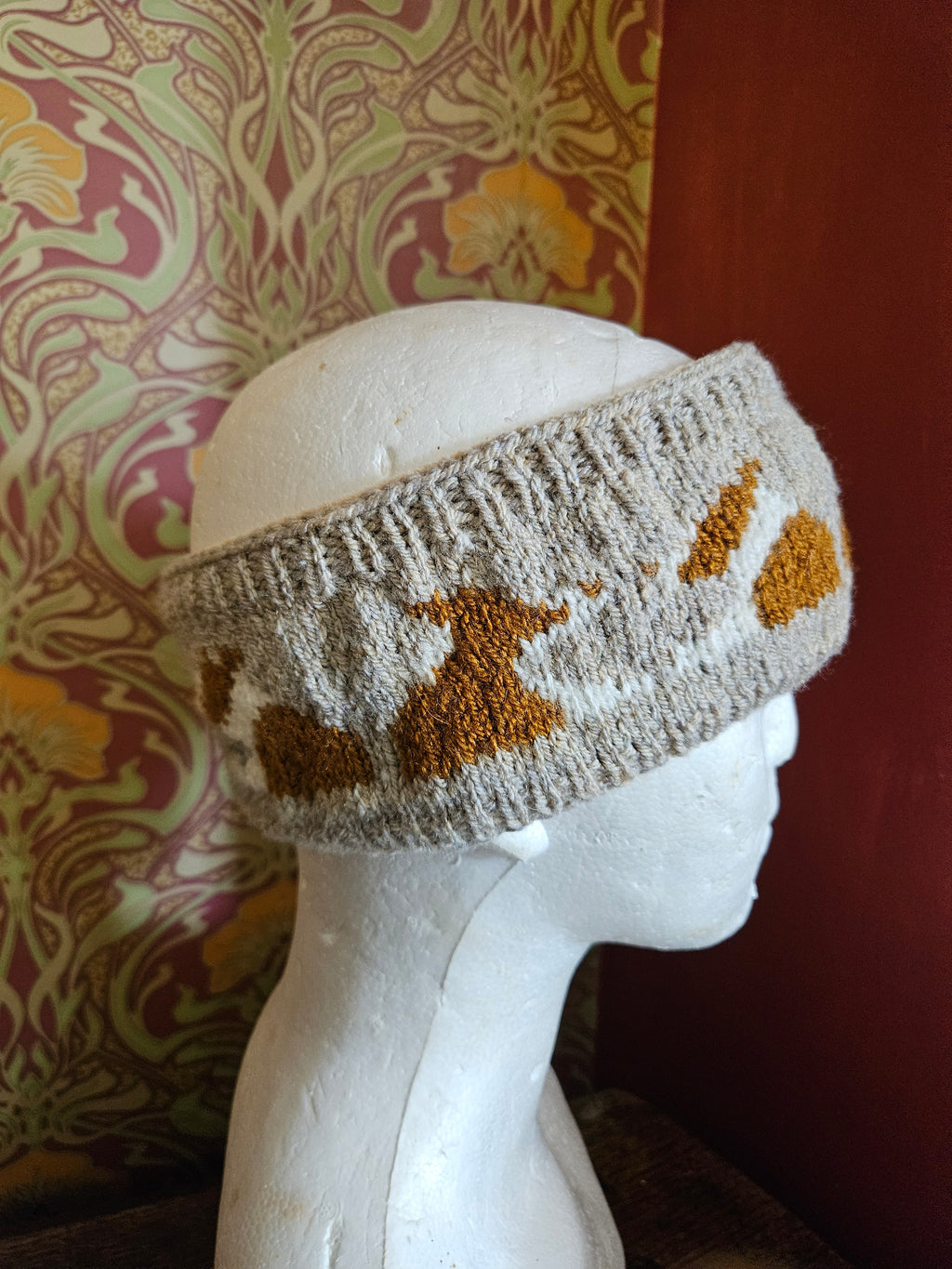 Earwarmer with red collies. Fully lined