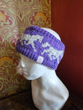 Earwarmer with horse design. Fully lined