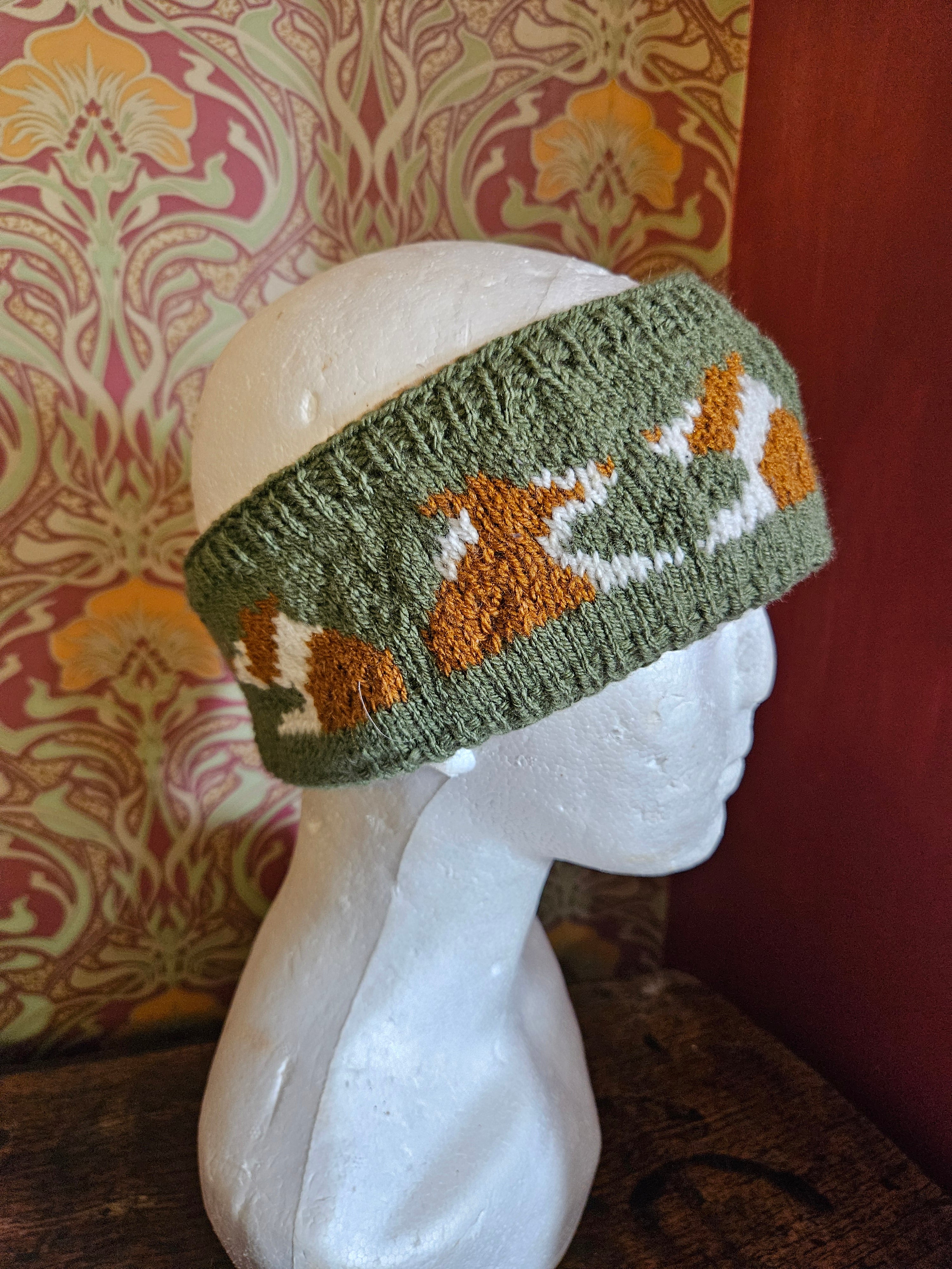 Earwarmer with red collies. Fully lined