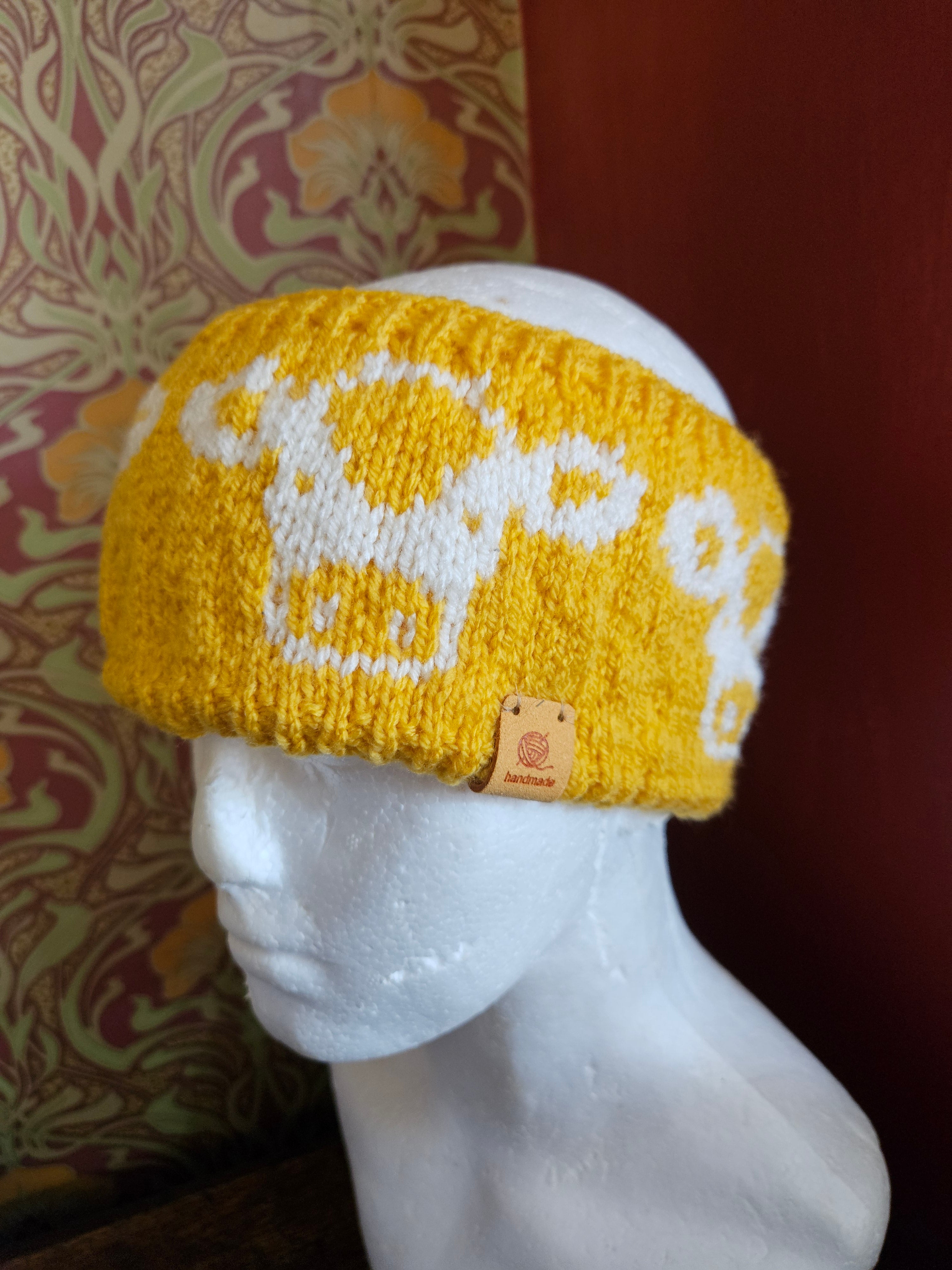Earwarmer with cow design  Fully lined