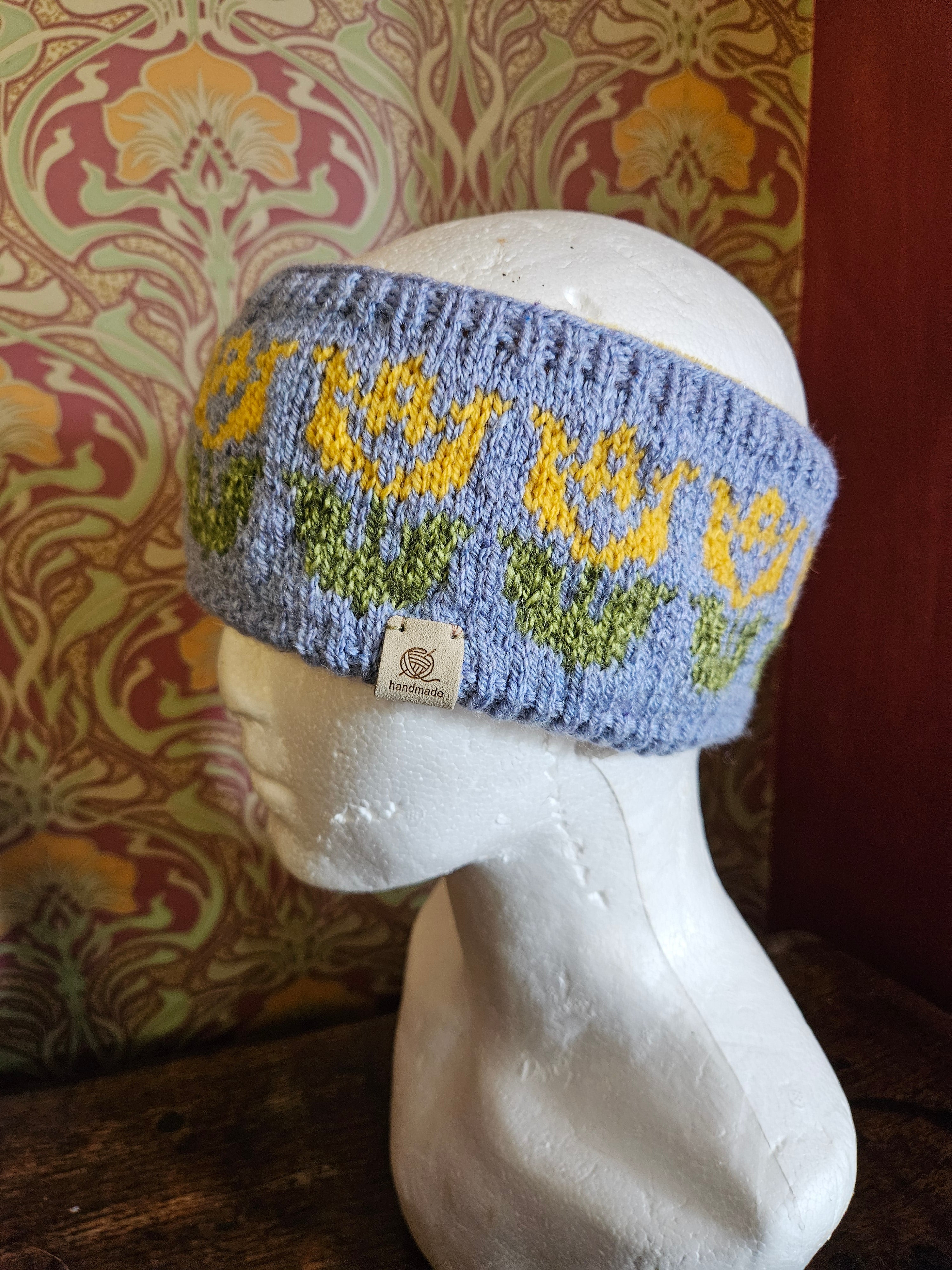 Earwarmer with floral design. Fully lined