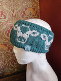 Earwarmer with cow design. Fully lined