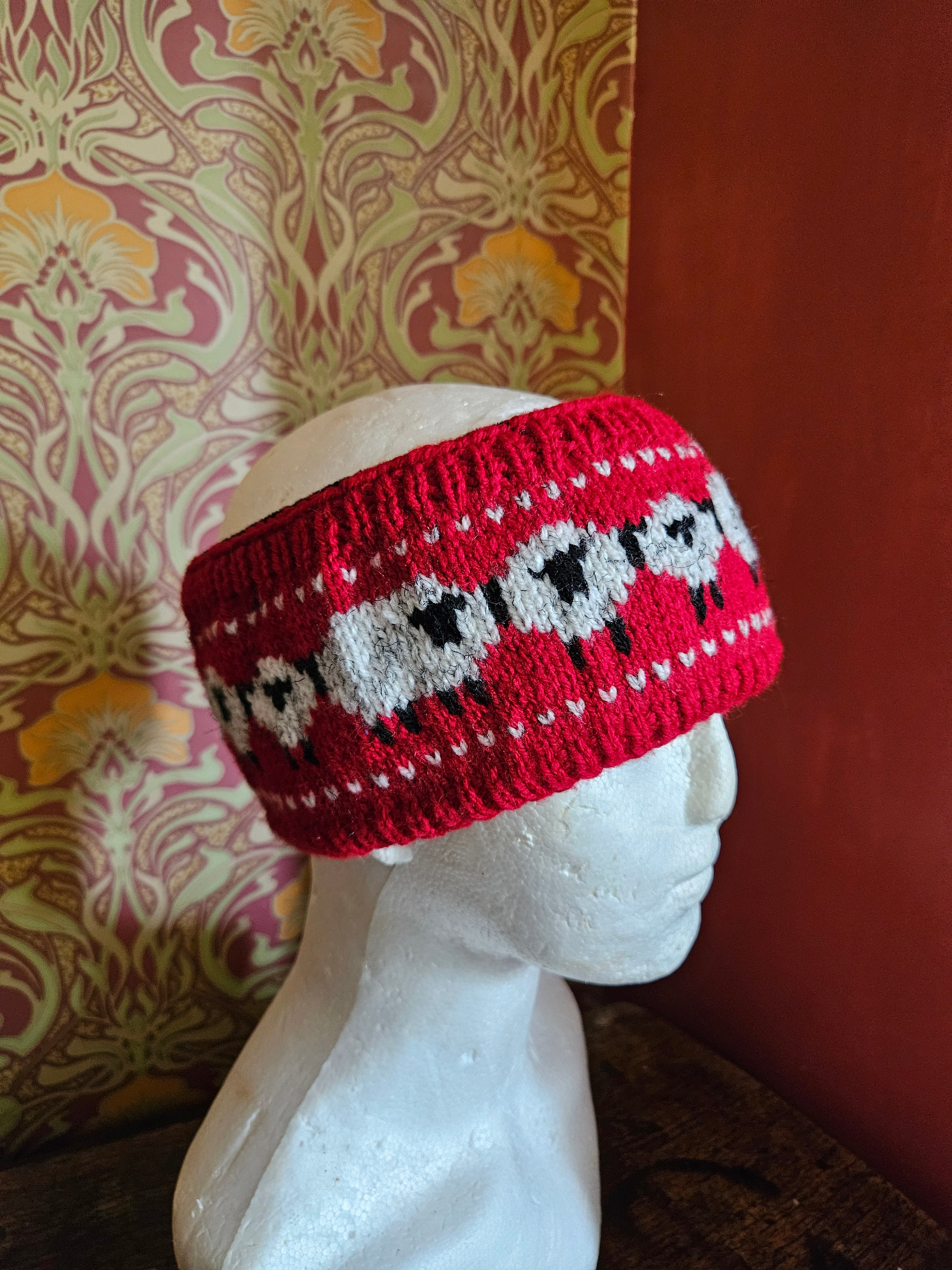 Earwarmer with sheep design.  Fully lined